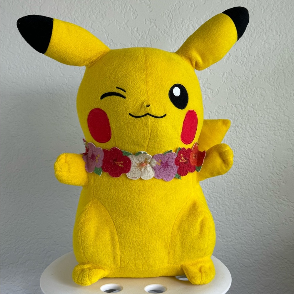 large hawaiian winking pikachu plushie stuffed animal with flowers